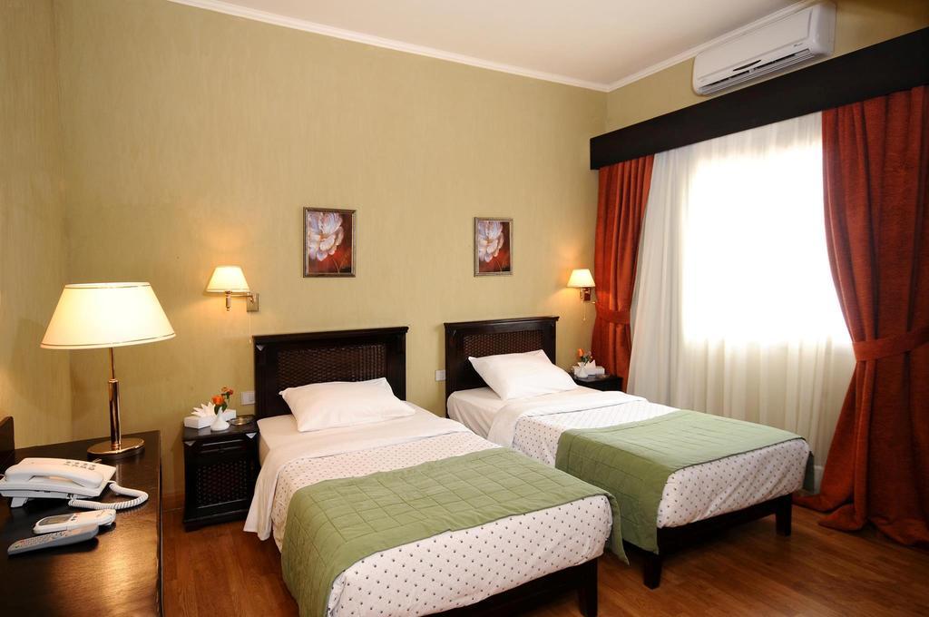 Green Plaza Inn "'Business &Families Only"' Αλεξάνδρεια Δωμάτιο φωτογραφία